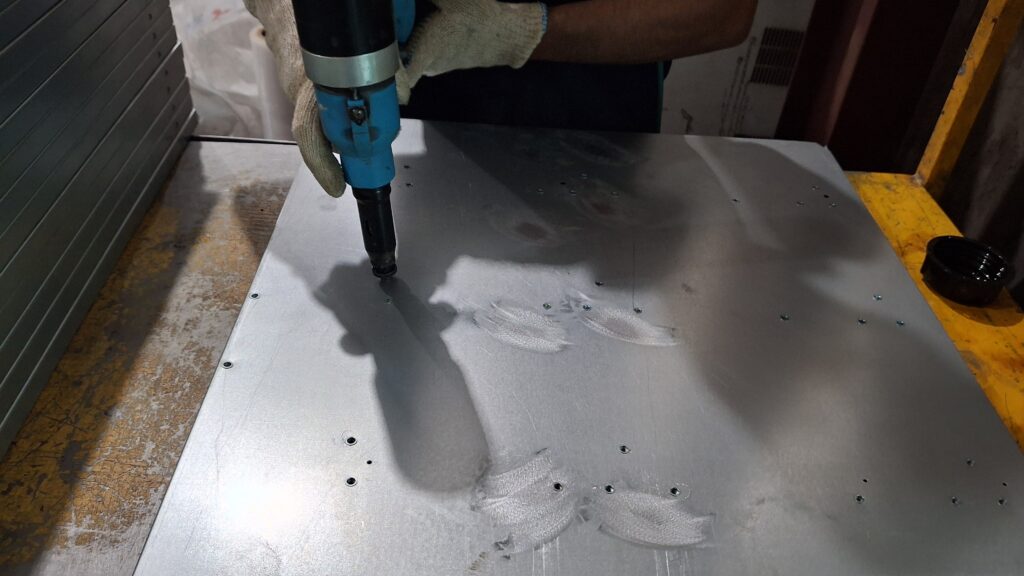 sheet metal fabrication hardware insertion